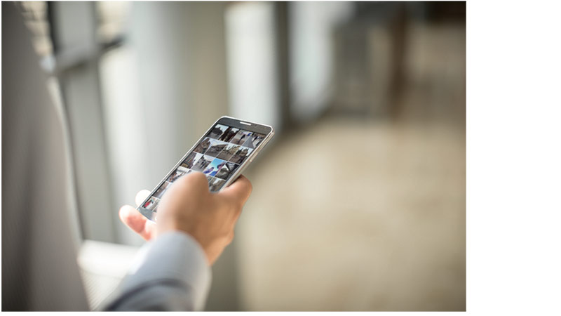 man holding mobile phone